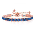 18K Rose Gold Created Blue Sapphire Princess Halo Pendant Necklace, Earrings and Tennis Bracelet Jewelry Set Plated